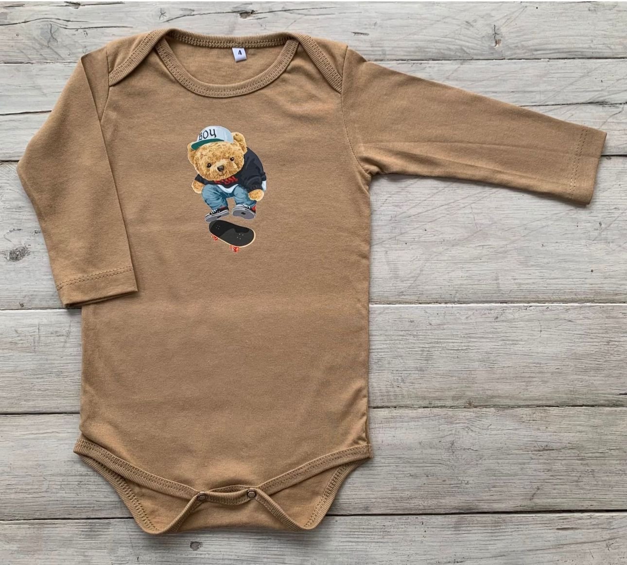 Body Teddy en patineta