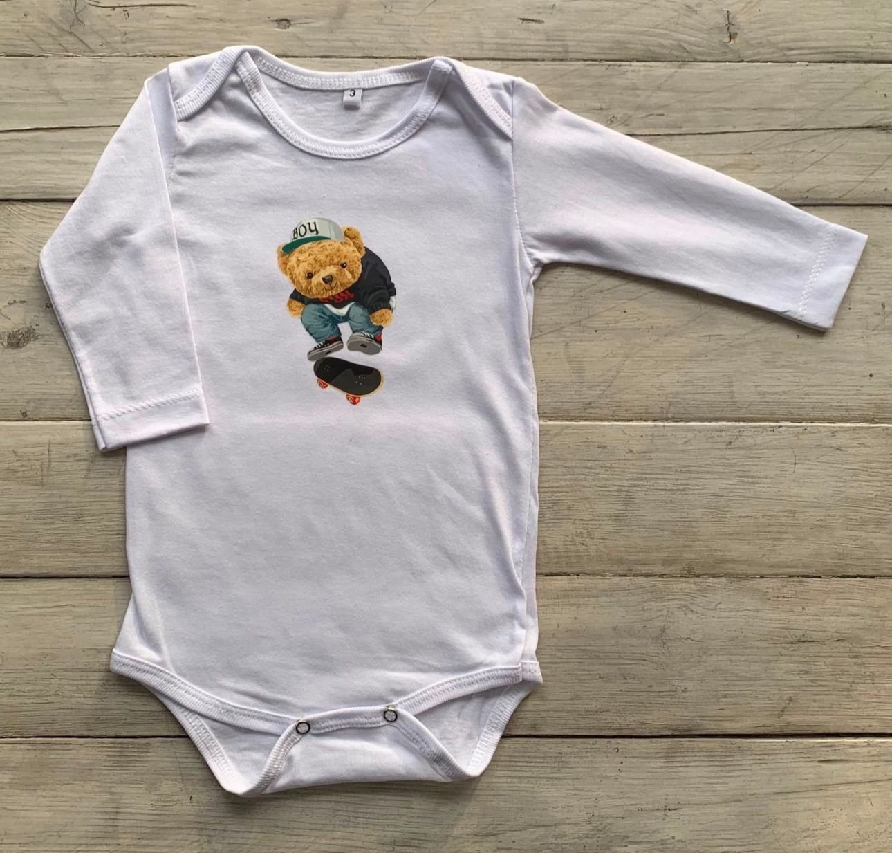 Body Teddy en patineta